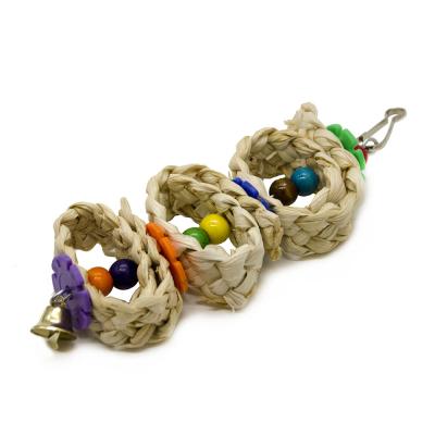 China New Viable Parrot Supplies Pet Bird Chew Toy Rattan Ball Skewer Oatmeal Skin Parrot Toy for sale