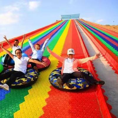 China Theme Park Colorful Dry Slide Kids Plastic Rainbow Slide For Sale for sale