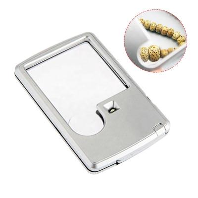 China Outdoor Camping 3-6 Times Lamp Rectangular LED Card Resin Optical Lens Portable Business Card Magnifier for sale