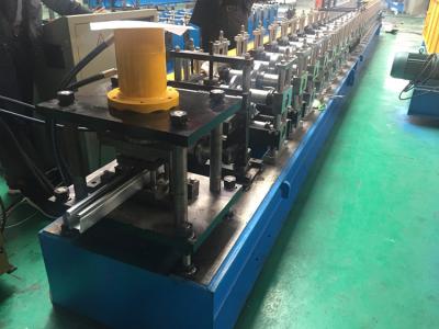 China Mute Roller Shutter Door Track Roll Forming Machine With Saw Cutting for sale