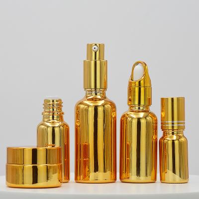 China 10ml 20ml 30ml Premium Skin Care Premium Beard Oil Essential Cosmetic Dropper Bottle UV Gold Color for sale