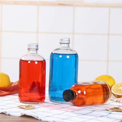 China Personal Care Fashion Custom Kombucha Boston Glass Bottle With Phenolic Cap And Beverage Glass Sports Water Glass Bottles for sale