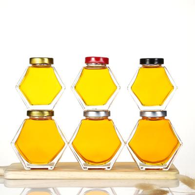 China Harmless Glass Jar 100ml 180ml 380ml Transparent Hexagonal Food Honey Glass Jar for sale