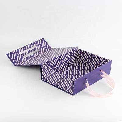 China Recyclable High Quality Custom LOGO Magnet Closure Folding Gift Box With Ribbon for sale