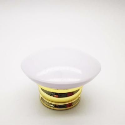 China Luxury Custom Smell Proof ABS Materials Round Black Perfume Bottle Lids, Caps, Closures With Gold Threaded Body for sale