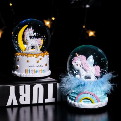 China Europe Resin Snow Lighting Crystal Globes With Creative Music Resin Snow Globe Ornaments for sale