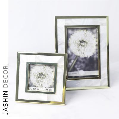 China Good Luxury New Design Shell Metal Design Photo View Velvet Stand Attractive Picture Frame for sale