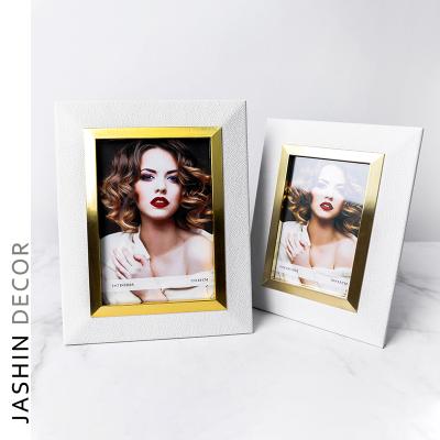 China Modern Luxury Metal Striping Photo Frames Modern Concise Photos Use Frame Glass Metal Art Picture Photo Frames for sale