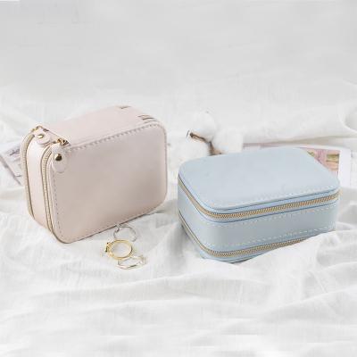 China Small Leather Bag Shape Traveling Leather Jewelry Collect And Storage Box With Double Zipper for sale