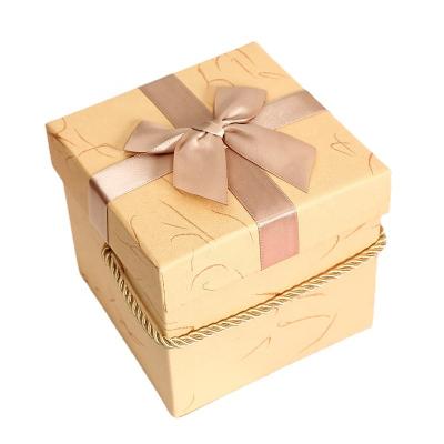 China Newest Design Handmade Two Pieces Christmas Gift Rigid Packing Box With Bowknot In Stock for sale