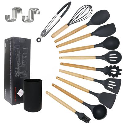 China Sustainable Kitchen Grill Utensils Silicone Wooden Toaster Food Tongs Function for sale