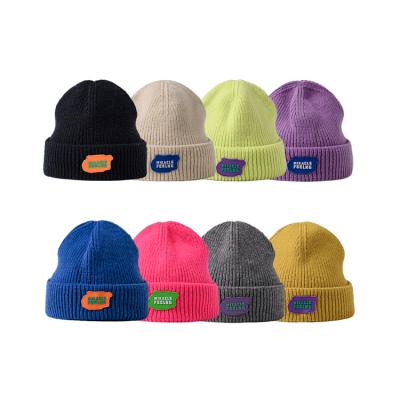 China Fashion JOINT Crochet Label Custom Woven Beanies Cream Color Streetwear Beanies Hats For Men Custom Made for sale