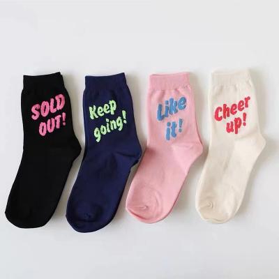 China Anti-slip Korean style designer word print fashion sport tubewholesale modern jacquard socks custom women socks for sale