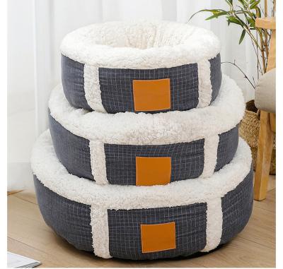 China Dropshipping Pet Dog Beds Eco Friendly Round Bed Viable Fabrics Furry Reddy Dog Beds For Small Dog for sale