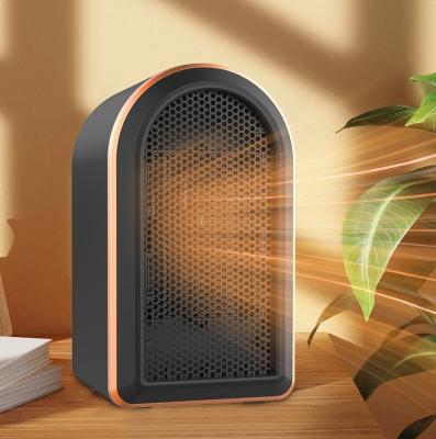 China English Operating Language Desktop Electric Room Heater 1200W PTC Portable Fan Heater for sale