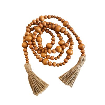 China Modern Nordic Style 225cm Colorful Hemp Rope Wood Bead With Tassels Kids Room Home Hanging Decoration for sale