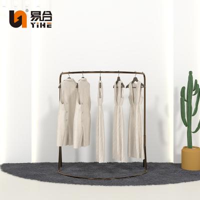 China Retail Custom Customized Metal Mounted Gold Clothing Display Racks Clothes Show Rack Garment Display Stand For Sale for sale