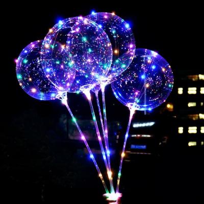 China Gift Toy Wholesale 20CM Transparent Inflatable Glowing Bobo Light Christmas Bobo Led Balloon for sale