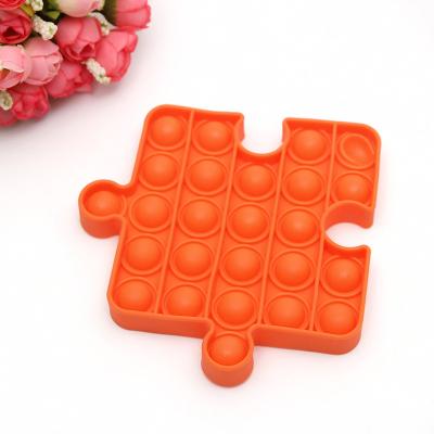 China Educational toy 2022 new style design rainbow tie-dye small jump toy jigsaw puzzle silicone fidgety person big puzzle toy for sale