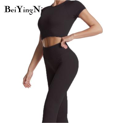 China Casual Breathable Fashion Plus Size Sports Bra Yoga Set For Women Sportswear Fits Short Sleeve Crop Top Gym Clothes Set Two Piece Pants for sale