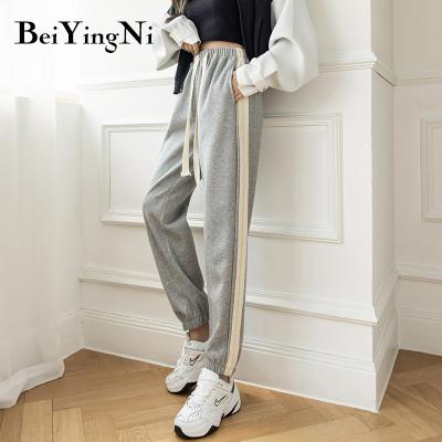 China Anti-wrinkle female pants striped casual sport joggers women elastic waist harem pants working top for woman sweatpants for sale