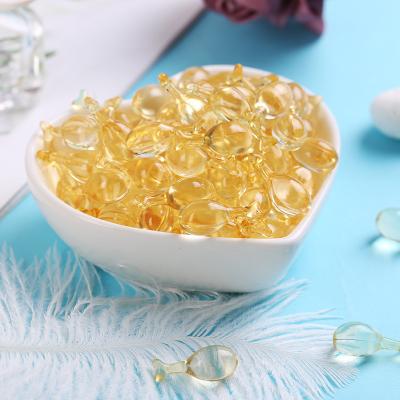 China Moisturizer Private Label Oligopeptide Chicken Drumstick Transparent Yellow Essence Soft Capsule OEM Treating OEM Cosmetic Essence for sale