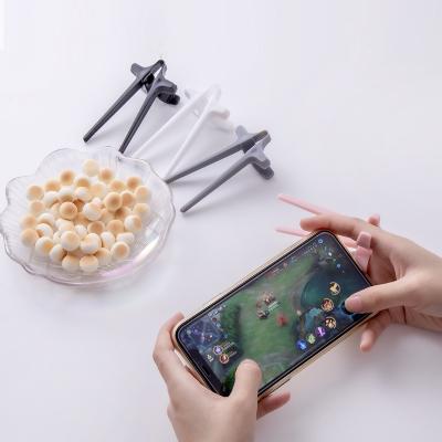 China Viable Keep Clean Gaming Clip Snack Finger Assistant Chopsticks For Gamers for sale