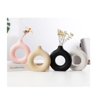 China Modern Home Modern Cavity Pottery Set Decor Living Room Office Decoration Donut Nordic Ceramic Vase White Pink Flower Modern Desktop for sale