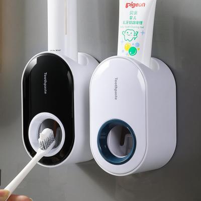 China Manufacturer Stocked Direct Supply Wall Mounted Bathing Room Plastic Toothpaste Holder Squeezer Dispenser for sale