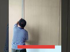 Installation of wood veneer panels with metal lines