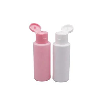 China Simple Clear Plastic Empty Travel Mini Shampoo Bottles Plastic 60ml PET Bottle For Toner With Flip Cap for sale