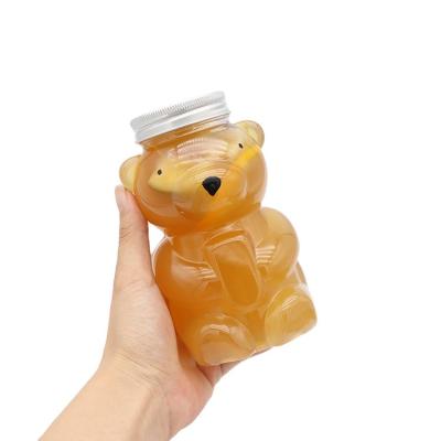 China Customized Single Logo 400ml Single Bear Shape PET Plastic Water Cold Dress Beverage Bottle Juice Bottle With Aluminum Lid for sale