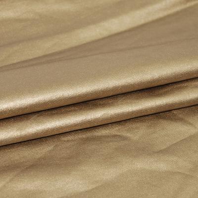 China Sustainable luxury knit jersey gold fabric gold fabric polyester foil 100% lightweight garment curtain fabric blackout for sale