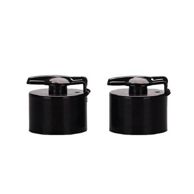 China Non Refillable Plastic Cosmetic Packaging 28mm Flip Top Cap Lids 24mm Plastic Cap for sale