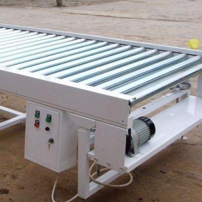 China JIEXUN Manufacturing Gravity Roller Conveyor Heat Resistant Machinery for Carton Boxes Warehouse Logistics for sale