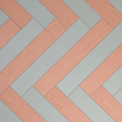 China Water Resistant Stain Free Shipping Mixed Herringbone Parquet Red Color Laminate Flooring for sale