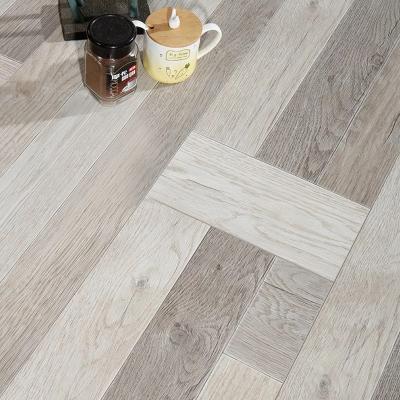 China Water Resistant Popular Style Class 32 High Gloss German Waterproof Wood Laminate AC4 Flooring for sale