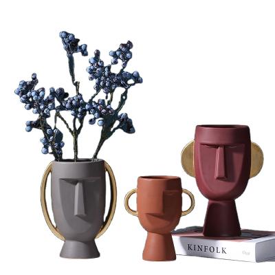 China Art Decor Creative and simple modern home open head Nordic face decorations ornaments style ceramic vase for sale