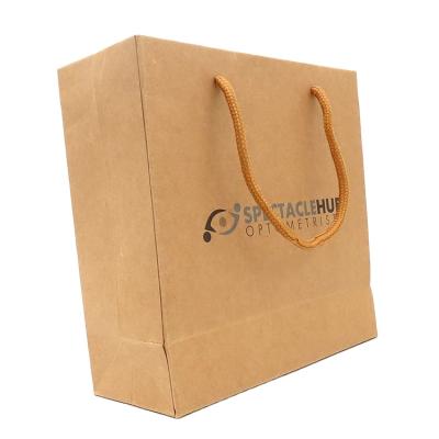 China Recycled Materials Wholesale Luxury Brown Kraft Paper Gift Paper Shopping Bag Packaging Craft With Your Own Custom Printing Logo Ribbon Handle for sale