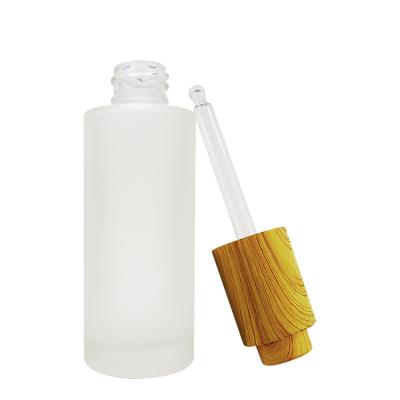 China Non Spill 18mm Bamboo Push Button Dropper Push Dropper For Oil for sale