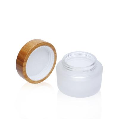 China Cosmetic Jar 45ml High Quality Glass Cream Bottle With Bamboo Lid for sale