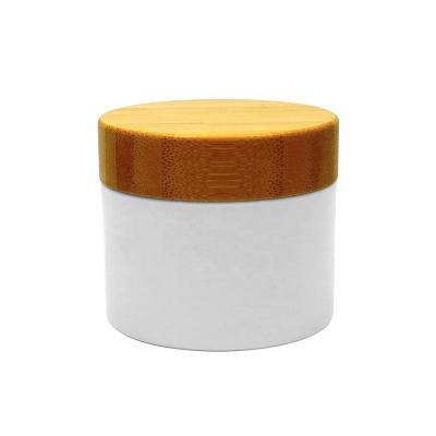 China 50g plastic white cream jar skin care cream with bamboo lids for cosmetic packaging for sale