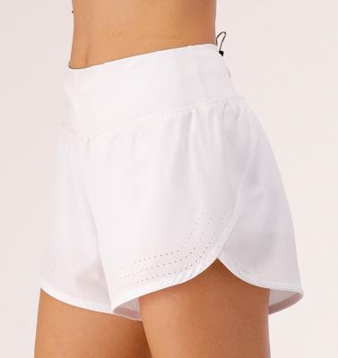 China Breathable Women's 2 in 1 Running Shorts with Zip Pockets High Waisted laser cut  Athletic Workout Gym Shorts for Women with Liner for sale