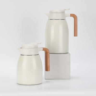 China Viable Vacuum Insulation Water Jug Vacuum Coffee Pot Stainless Steel Double Wall Thermal Coffee Carafe with Wood Handle for sale