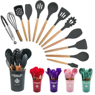 China Sustainable Kitchen Utensils Set 13 Pcs Silicone Nonstick Barreled Cookware Set Wooden Handle Kitchenware Set for sale