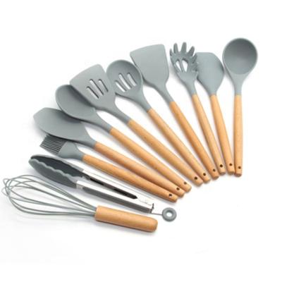 China Sustainable Cookware Set 11Pcs Non-stick Wooden Silicone Handle Kitchenware Set for sale