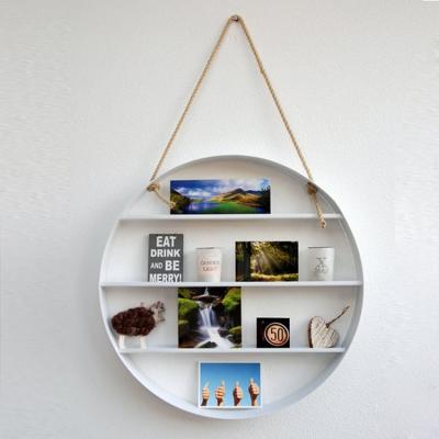 China Creatvie 20% OFF Modern Simple Round Iron Creative Floating Shelf Wall Hanging Decor for sale