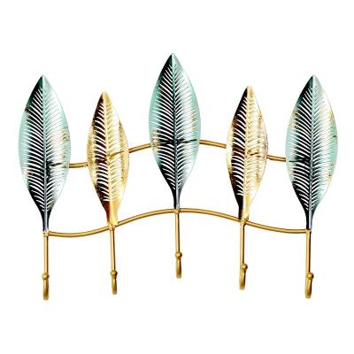 China New Design Shiny Metal Leaf Hook Metal Home Decoration Hanger for sale