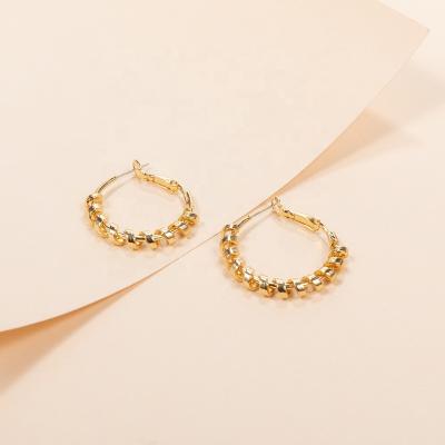 China Fashion New Korean Special Unique Design Jewelry Stretch Spring Spring Brass Wire Watch 25mm Hoop Earrings For Women Gold Plated for sale