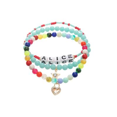 China New Design High Quality Multi Color Beaded Elastic Bracelet With Star Heart Shape Padlock Charm for sale